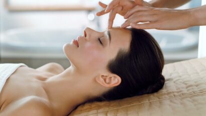 Women receiving a head massage.