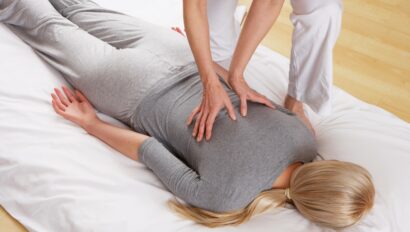 Women receiving a full body massage.