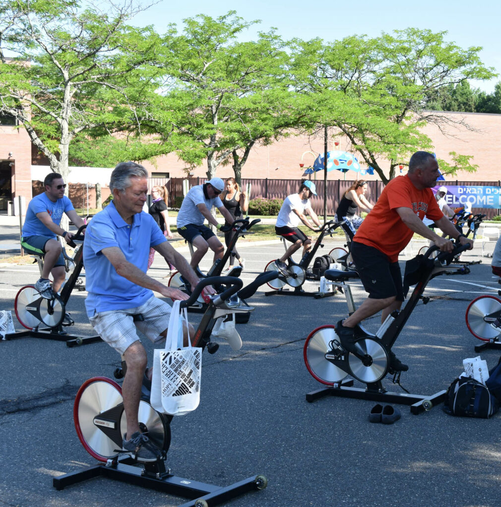 People riding on stationary bikes.