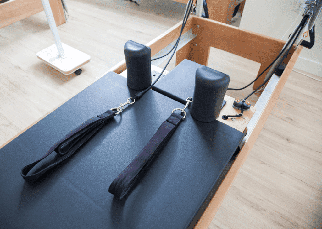 State-of-the-art Pilates equipment, including reformers and towers, at Kaplen JCC on the Palisades studio.