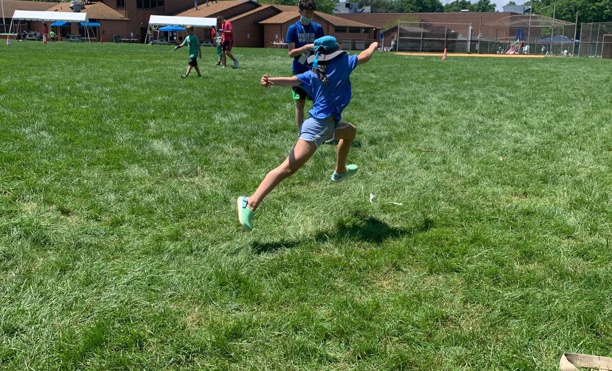 Child happy running outside.