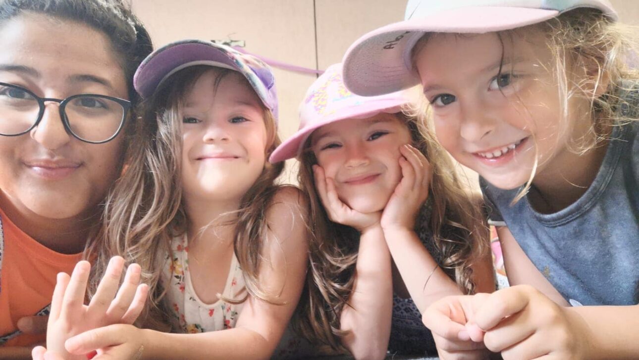 Children smiling at camp.