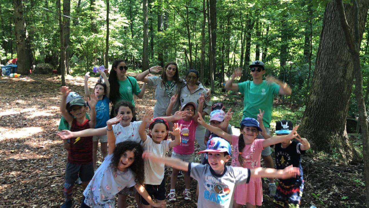 Group photo of children at camp.