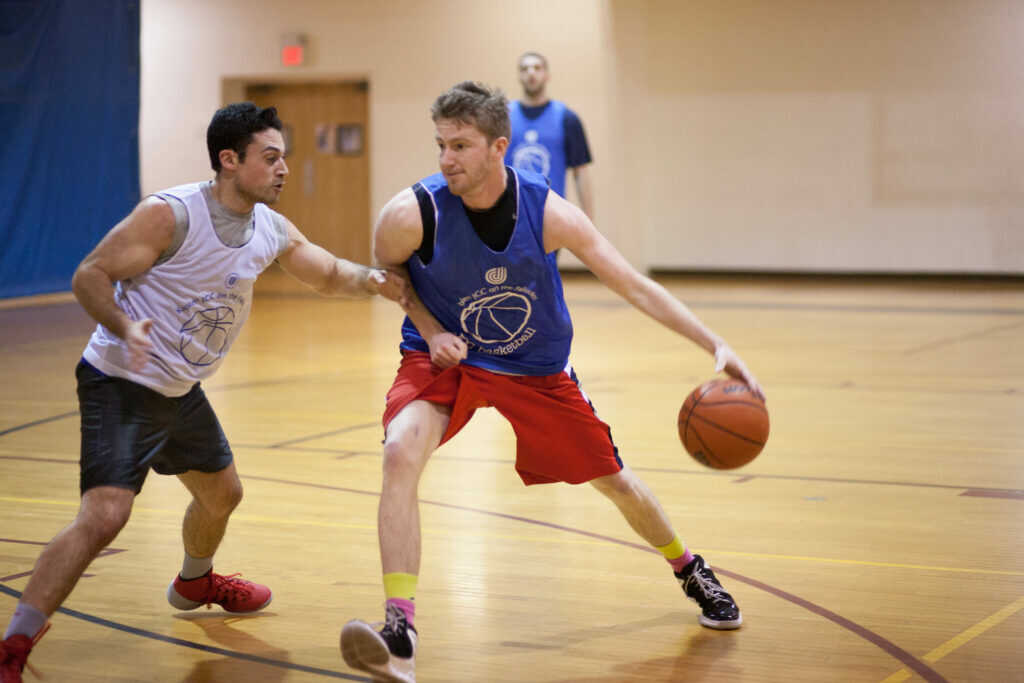 Men playing basketball at the Kaplen JCC on the Palisades.